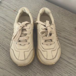 Toddler GUCCI shoes ( REAL ) worn maybe 2/3 times . The color is a beige color.